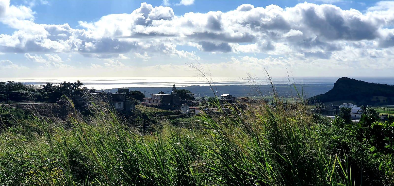 FOR SALE – Agricultural land of 2 acres located at “Les Mariannes” with a beautiful view on the Coin de Mire and the sea.